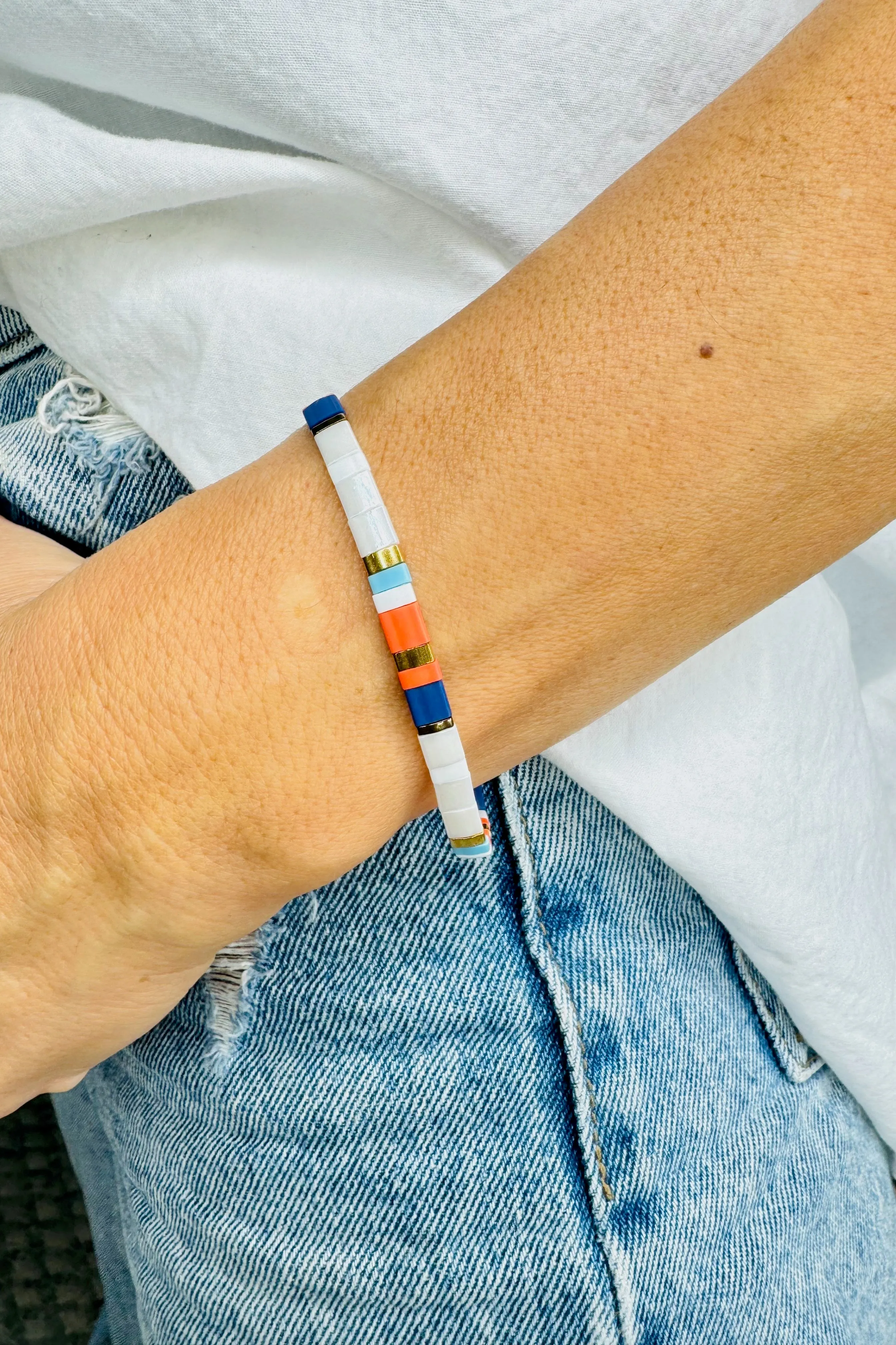 Handcrafted Multicolored Glass Bead Bracelet - White, Orange, and Blue