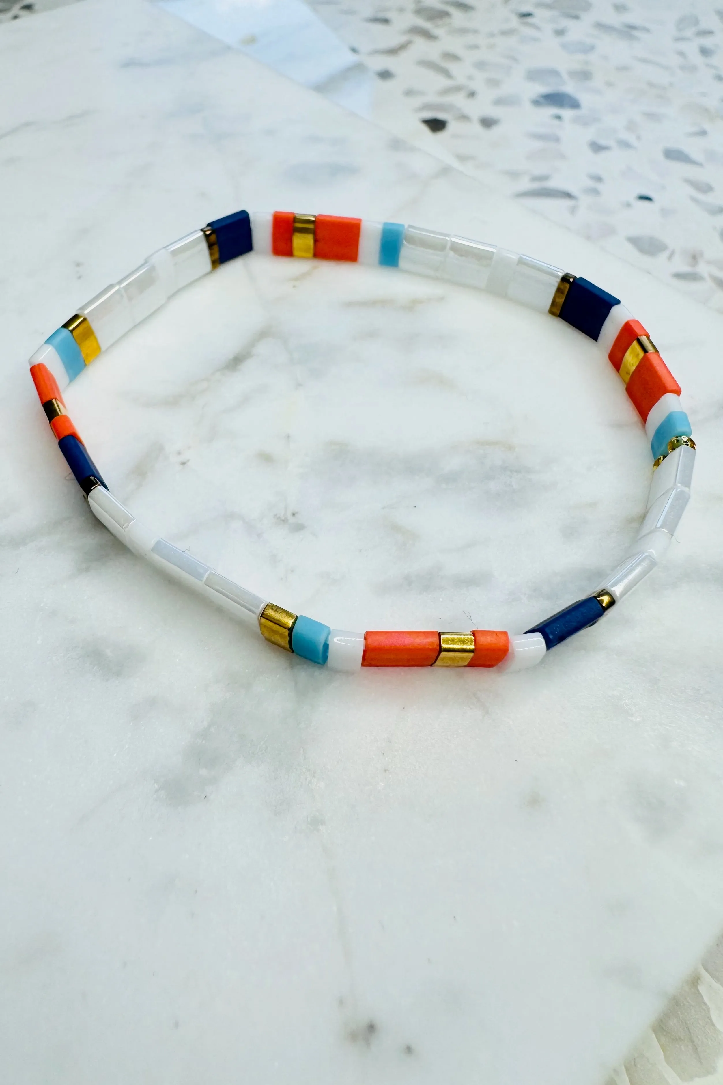 Handcrafted Multicolored Glass Bead Bracelet - White, Orange, and Blue